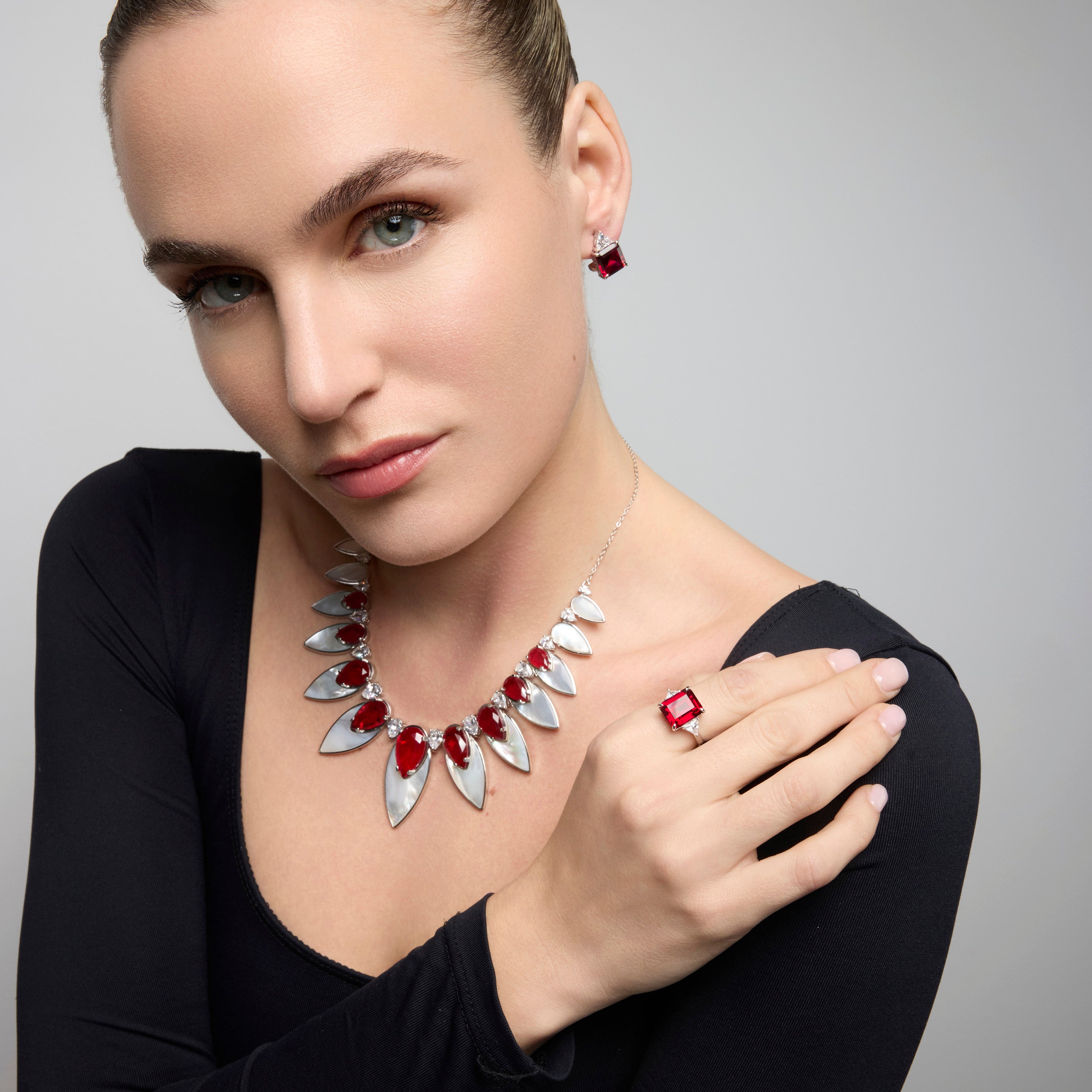 925 Sterling Silver and Ruby Zirconia Earrings with Rhodium Finish - Rukna