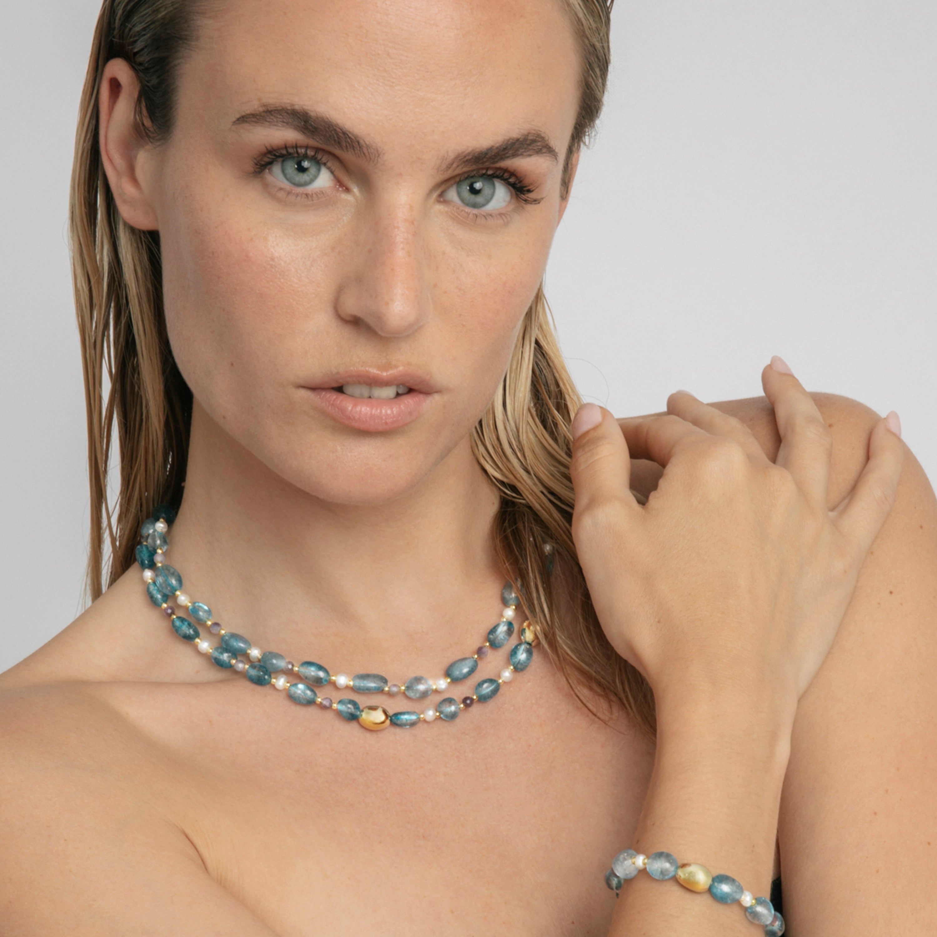 Collar de Plata de Ley 925 y Cristal Azul acabado en oro amarillo 18k - Aswudi