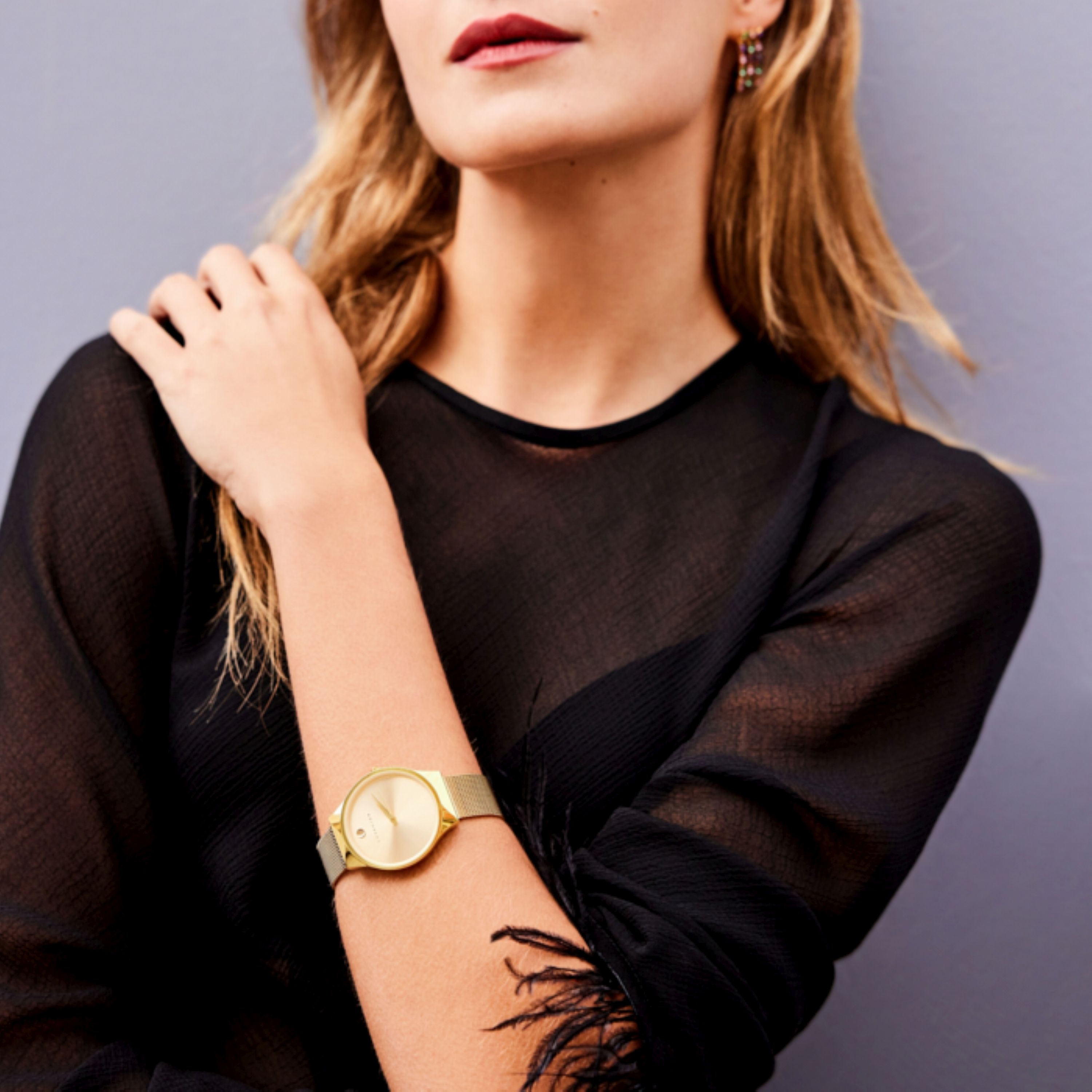 Relógio com acabamento em ouro amarelo 18K - Skab