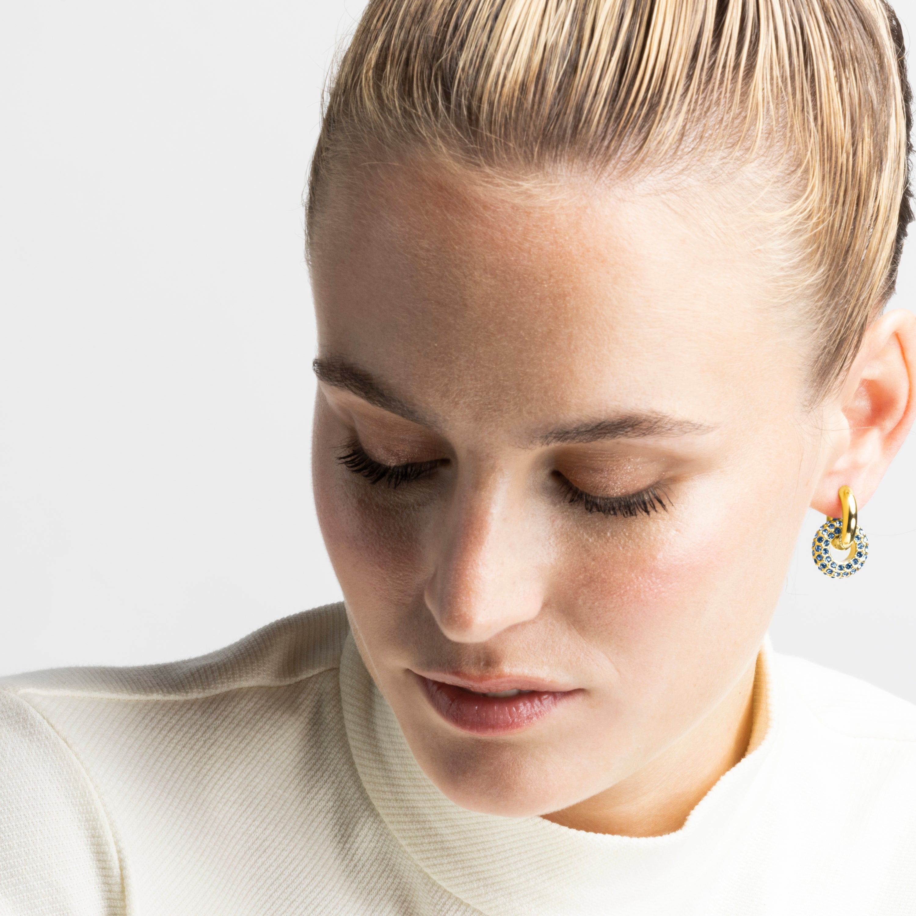 Pendientes con Cristal Azul Oscuro acabado oro 18k - Rawe