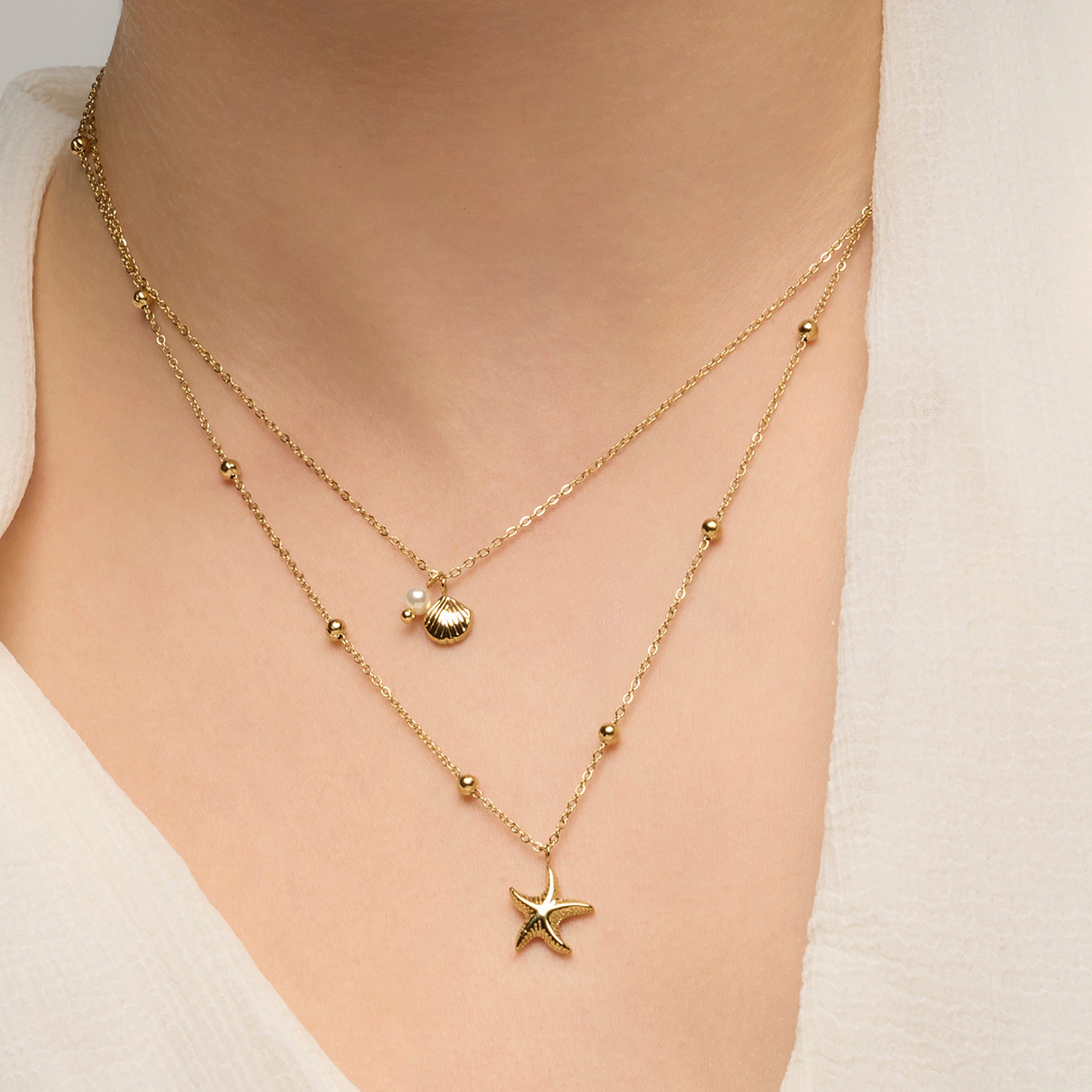 Colar com acabamento em ouro amarelo 18k e Pérola Branca - Stik