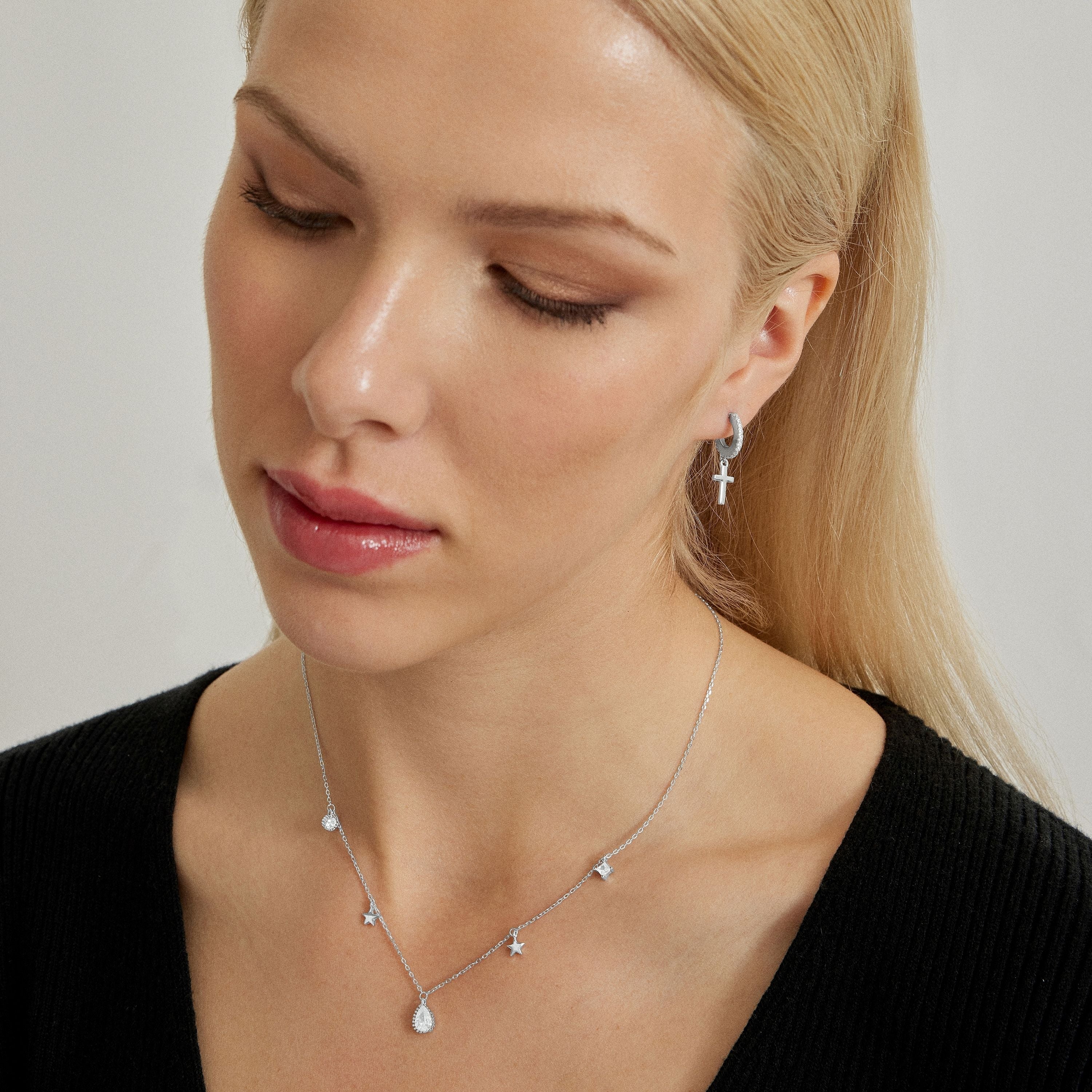 Rhodium-Plated Shimmering Cubic Zirconia Stud Earrings - Cross