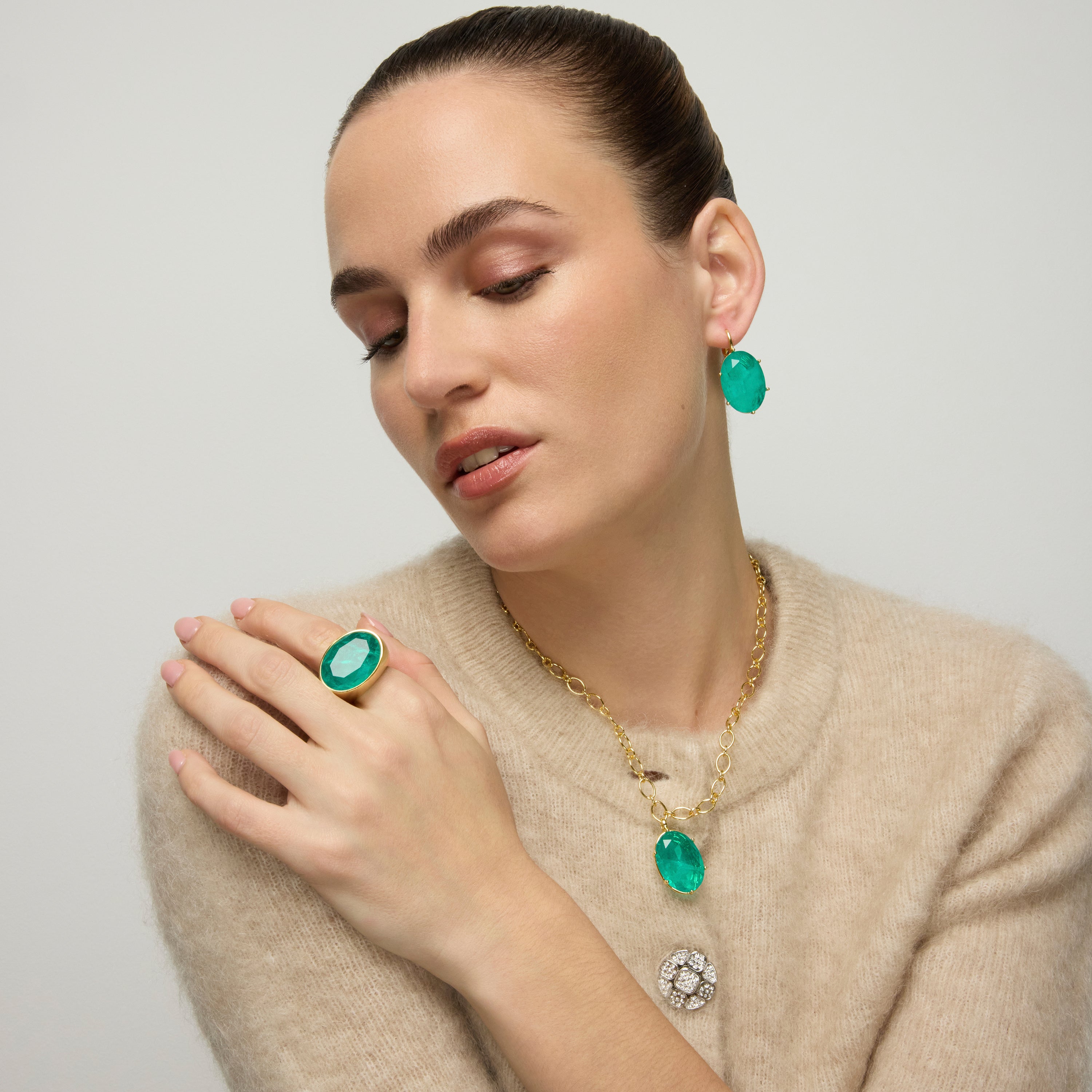 Anel de Prata 925 e Zircônia Verde com acabamento em ouro amarelo 18k - Jadir